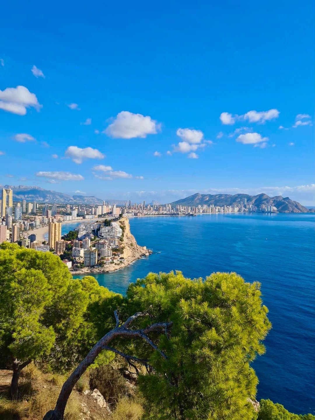 The bay from Serra Gelada with the coast beyond